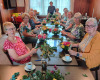 SZA 2025 bloemschikken en moza